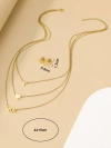A golden stainless steel heart-shaped necklace with the letter "you" stacked on top, paired with the same style of stud earrings, exudes a gentle, romantic, high-end and niche design Item Picture